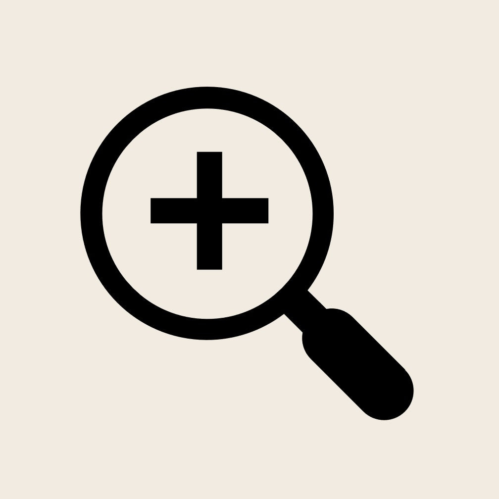 Magnifying glass with plus symbol — representing carefully curated products with clarity and honesty.